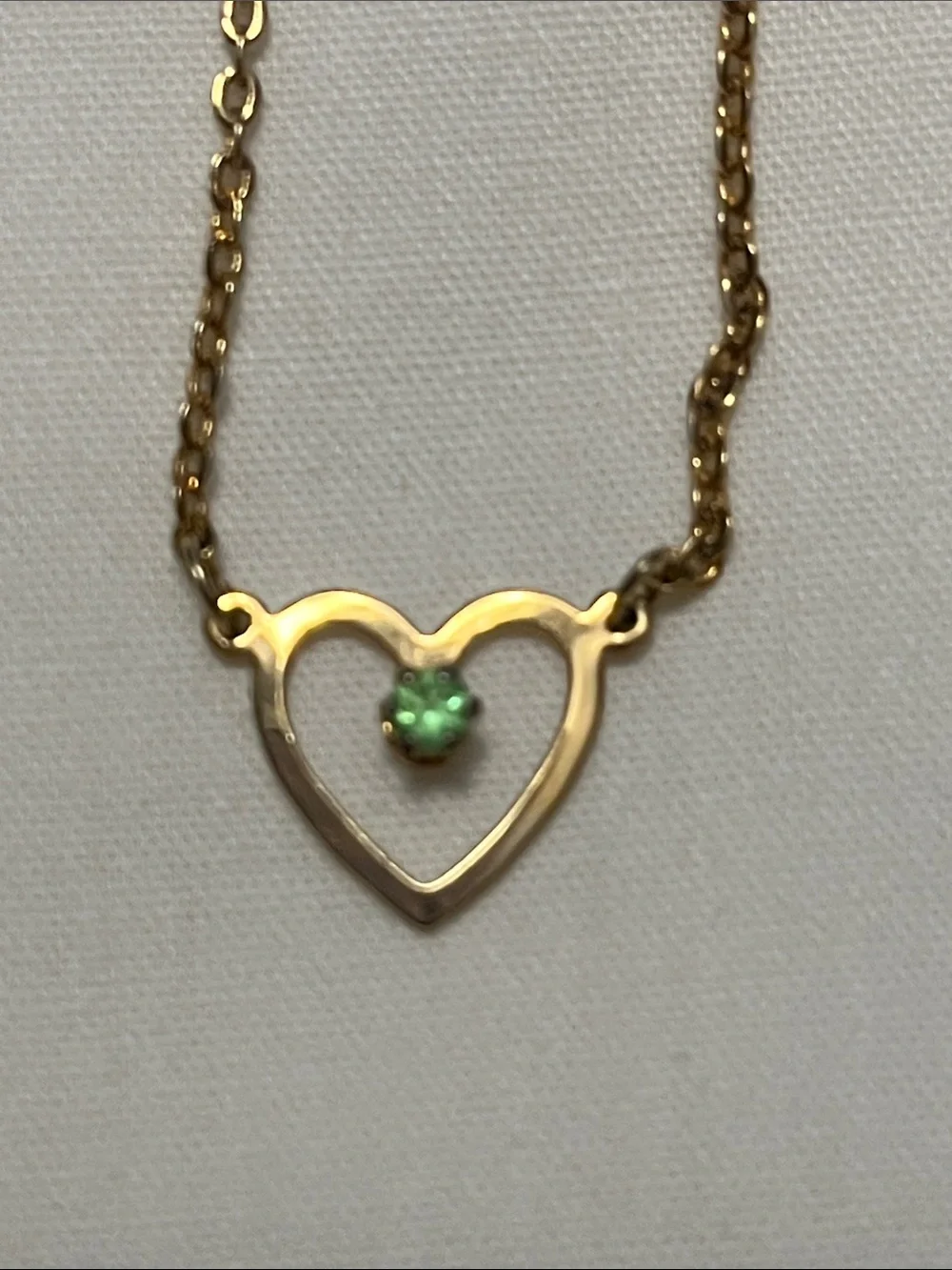 Avon gold tone